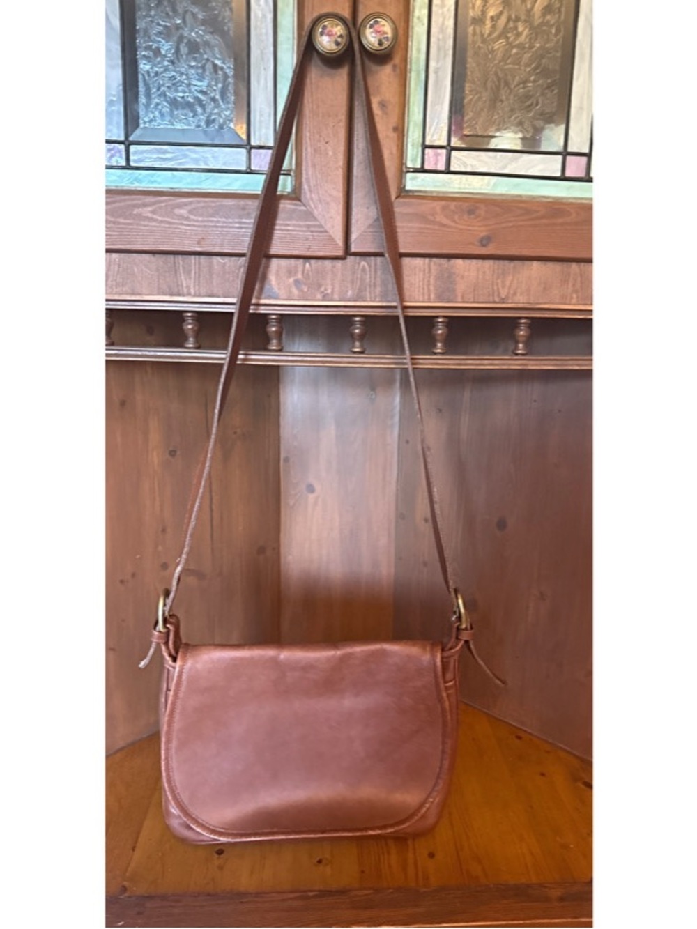 Coach vintage leather saddle-style crossbody bag